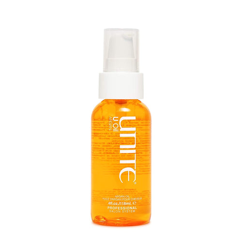 Unite - U Oil Clear bottle 4 oz.  with orange colored oil and white pump top and clear lid.