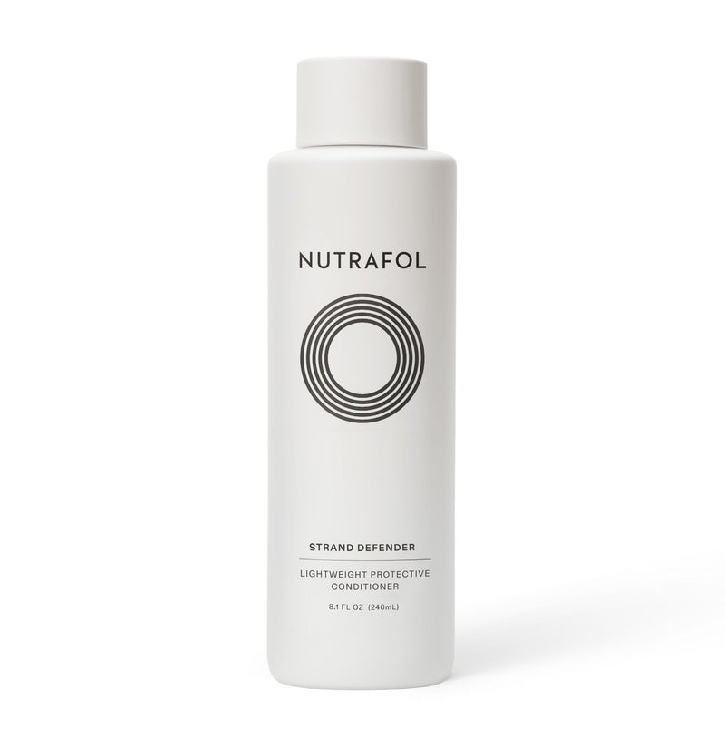 Nutrafol - Strand Defender conditioner bottle. White bottle with twist cap top.