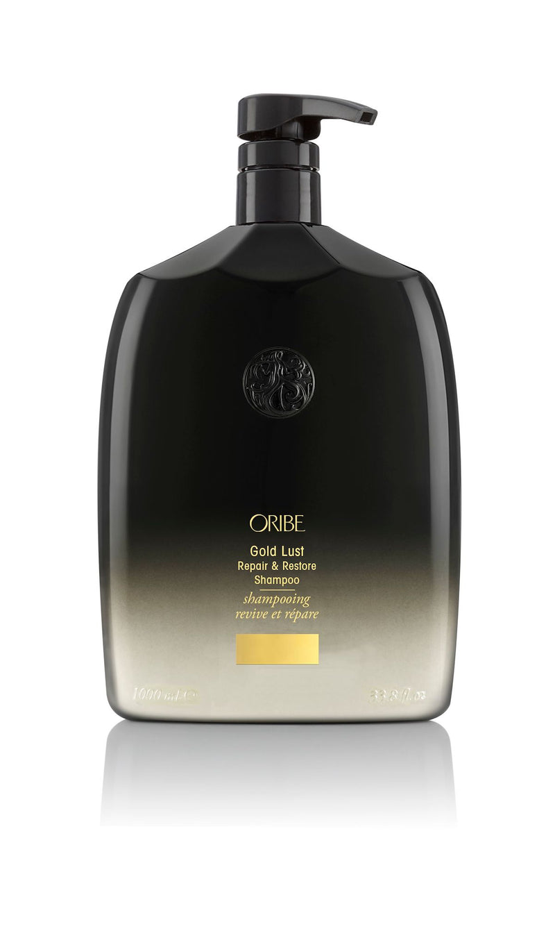 Oribe Gold Lust Repair & Restore Shampoo for damaged hair — 2.5 oz travel size.