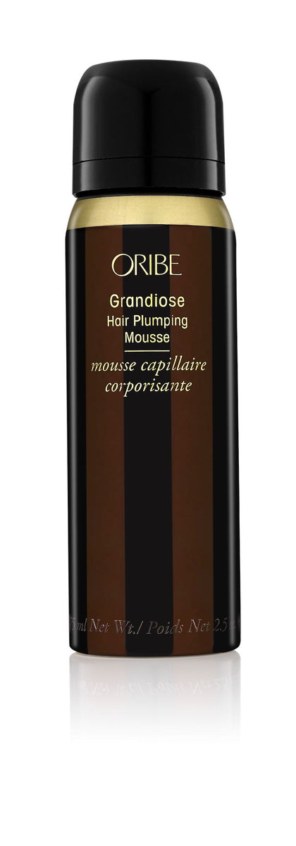 Oribe Grandiose Hair Plumping Mousse for volume and body — 2.5 oz travel size.