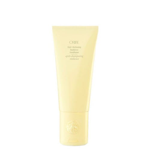 Oribe - Hair Alchemy Conditioner full size bright yellow bottle with flip top cap on bottom