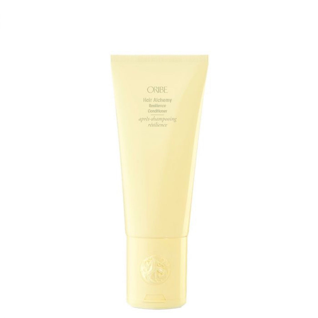 Oribe - Hair Alchemy Conditioner full size bright yellow bottle with flip top cap on bottom