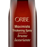 Oribe Maximista Thickening Spray for volume and lift — 1.7 oz travel size.