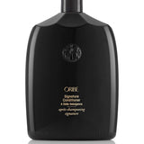 Oribe Signature Conditioner for all hair types — 1.7 oz travel size.