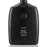 Oribe Signature Shampoo for all hair types — 2.5 oz travel size.