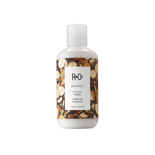 R+Co - JACKPOT Bottle with gold coins photo background