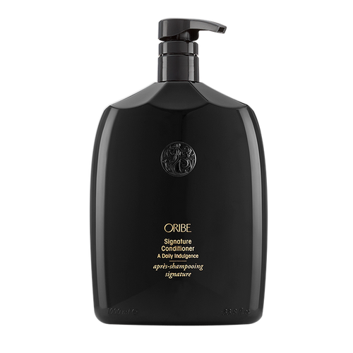 Oribe - SIGNATURE Conditioner liter sized bottle. All black with gold lettering and black pump top