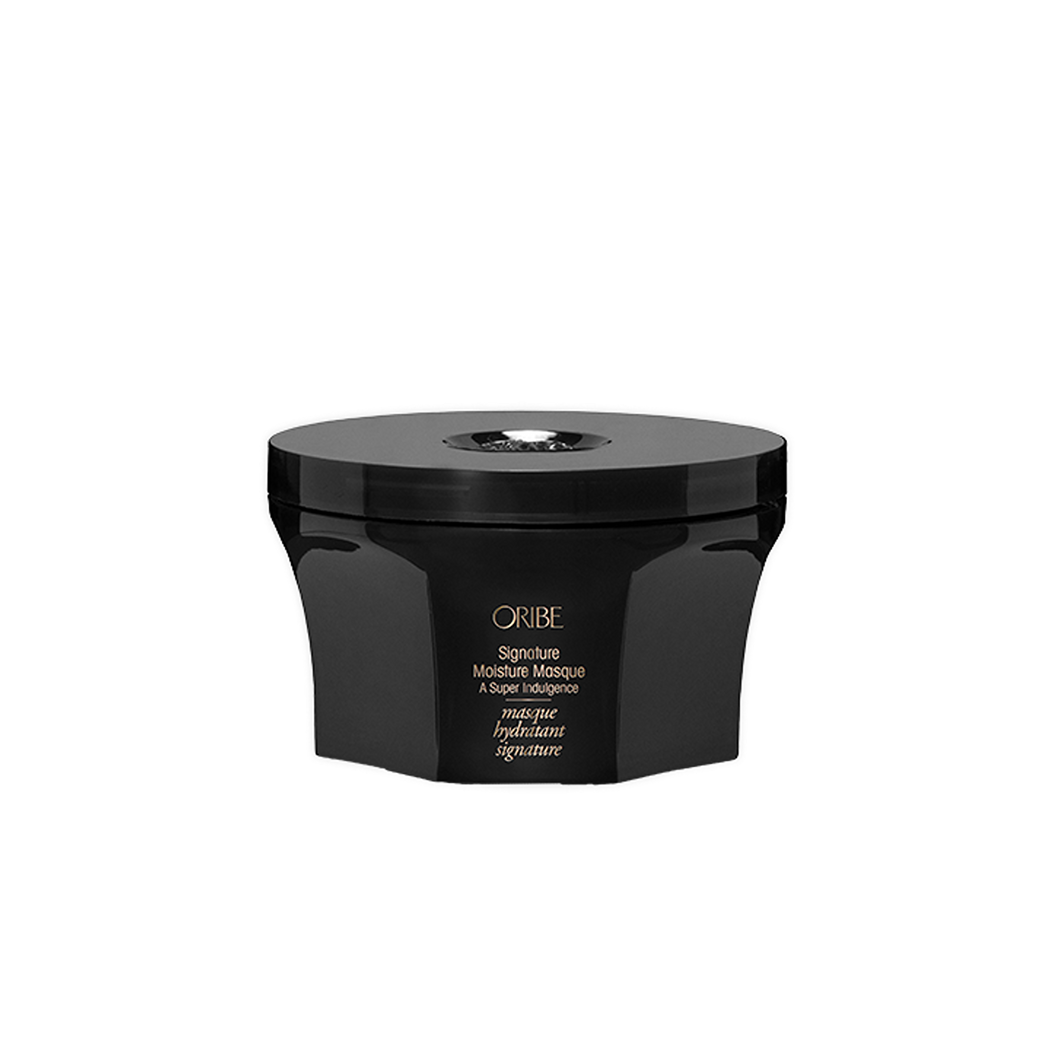 Oribe - Signature Moisture Masque black circular container with gold lettering and twist open top