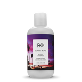 R+Co - SUNSET BLONDE Shampoo 8.5 oz bottle with purple graphic background 